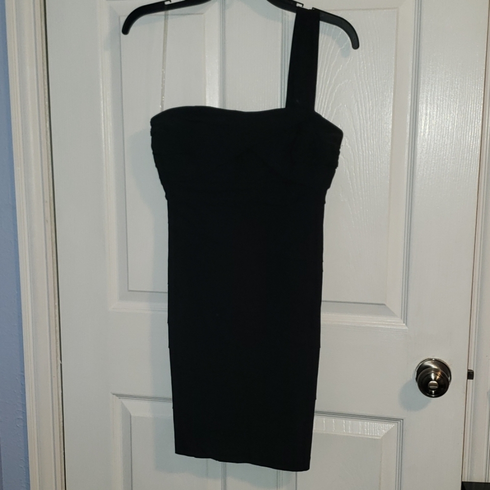 Little black dress. Off the shoulder. Body con